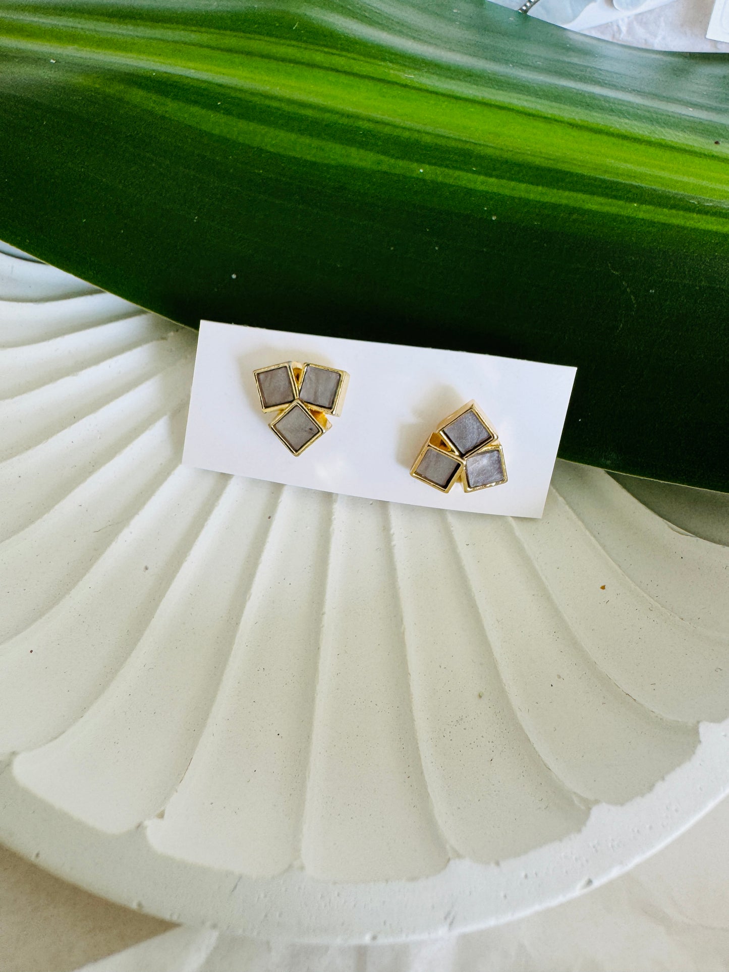 Grey triangle ear studs
