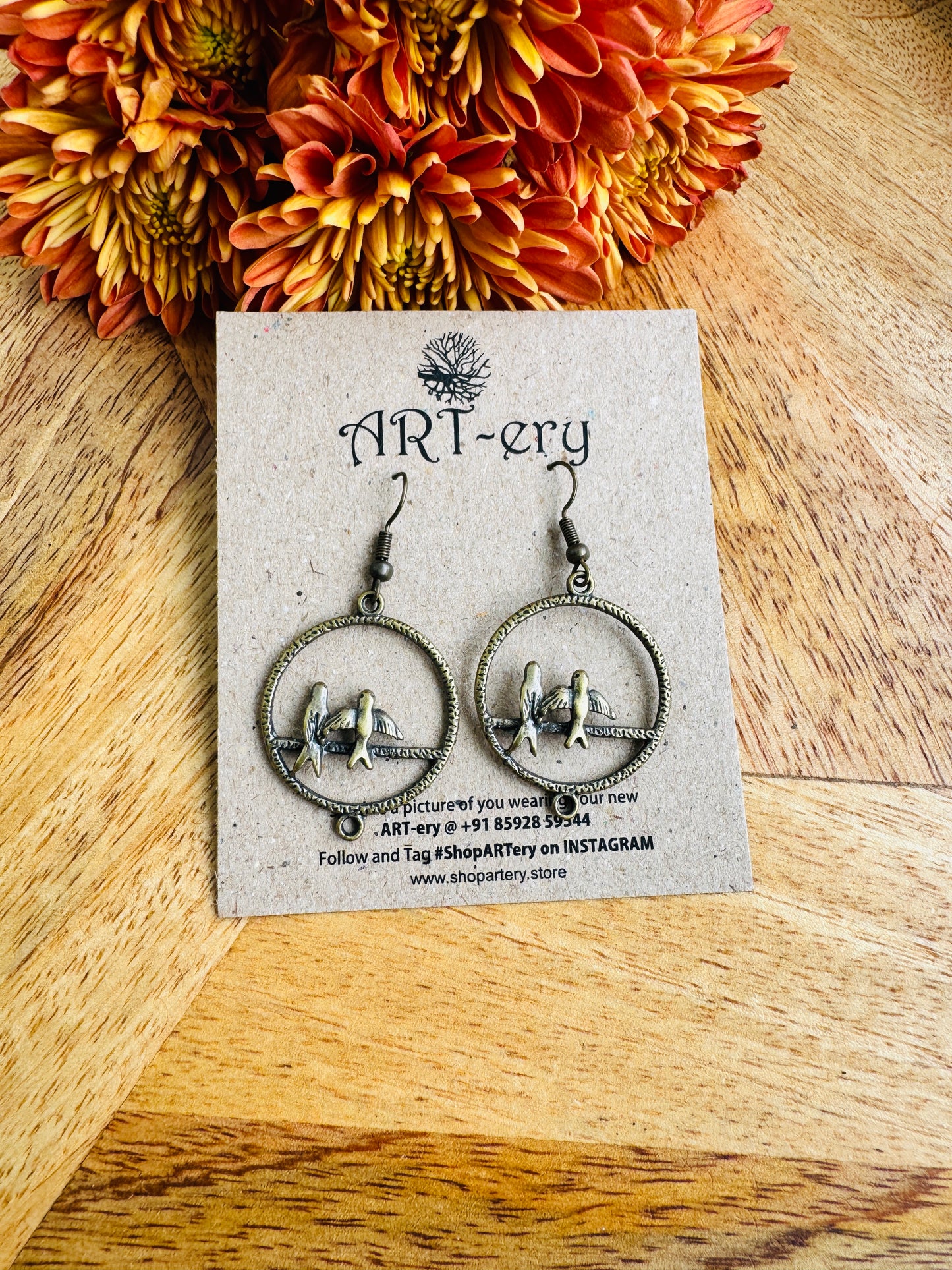 Sky Bird in earrings