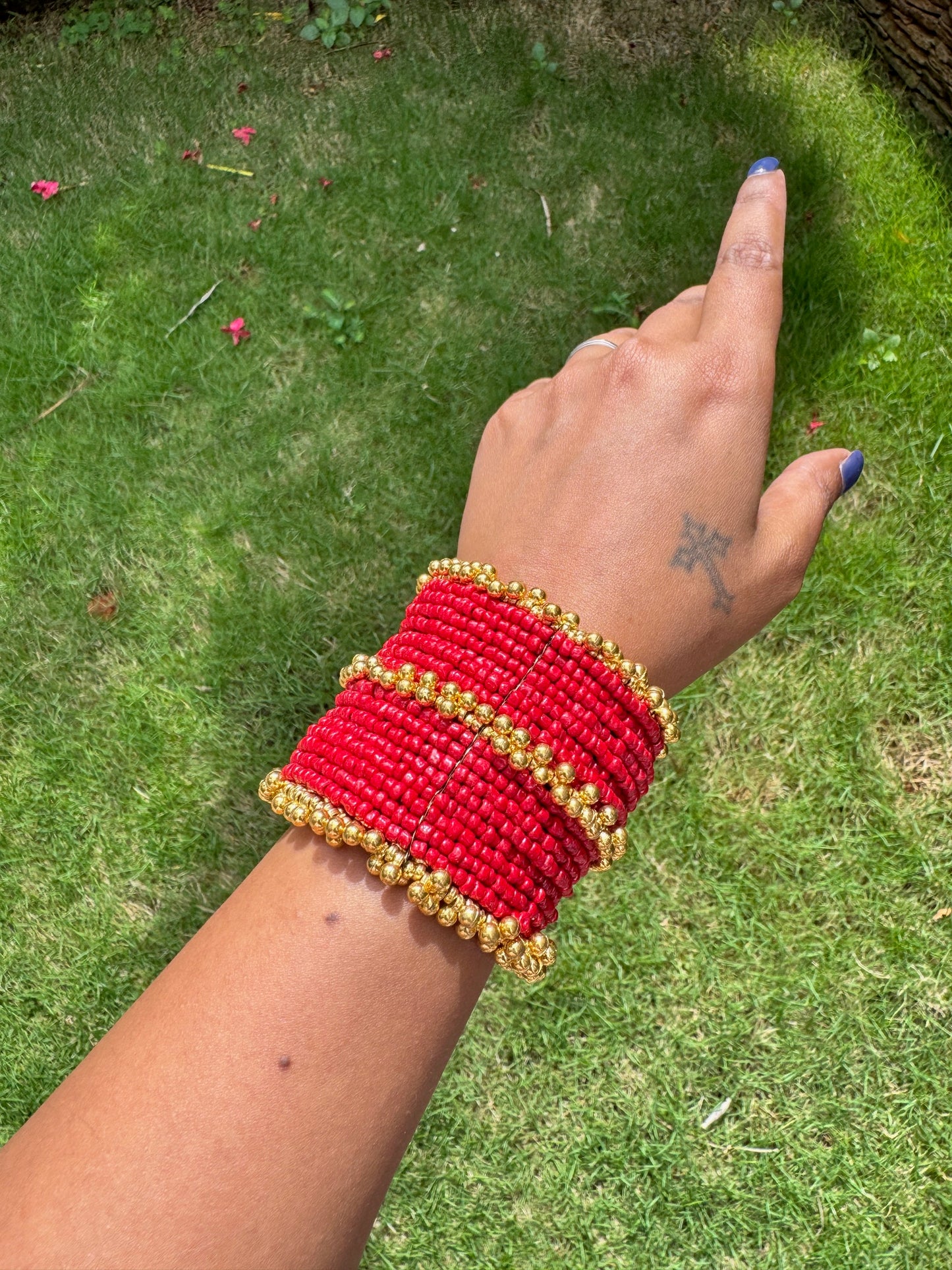 Broad beaded arm cuff - Red