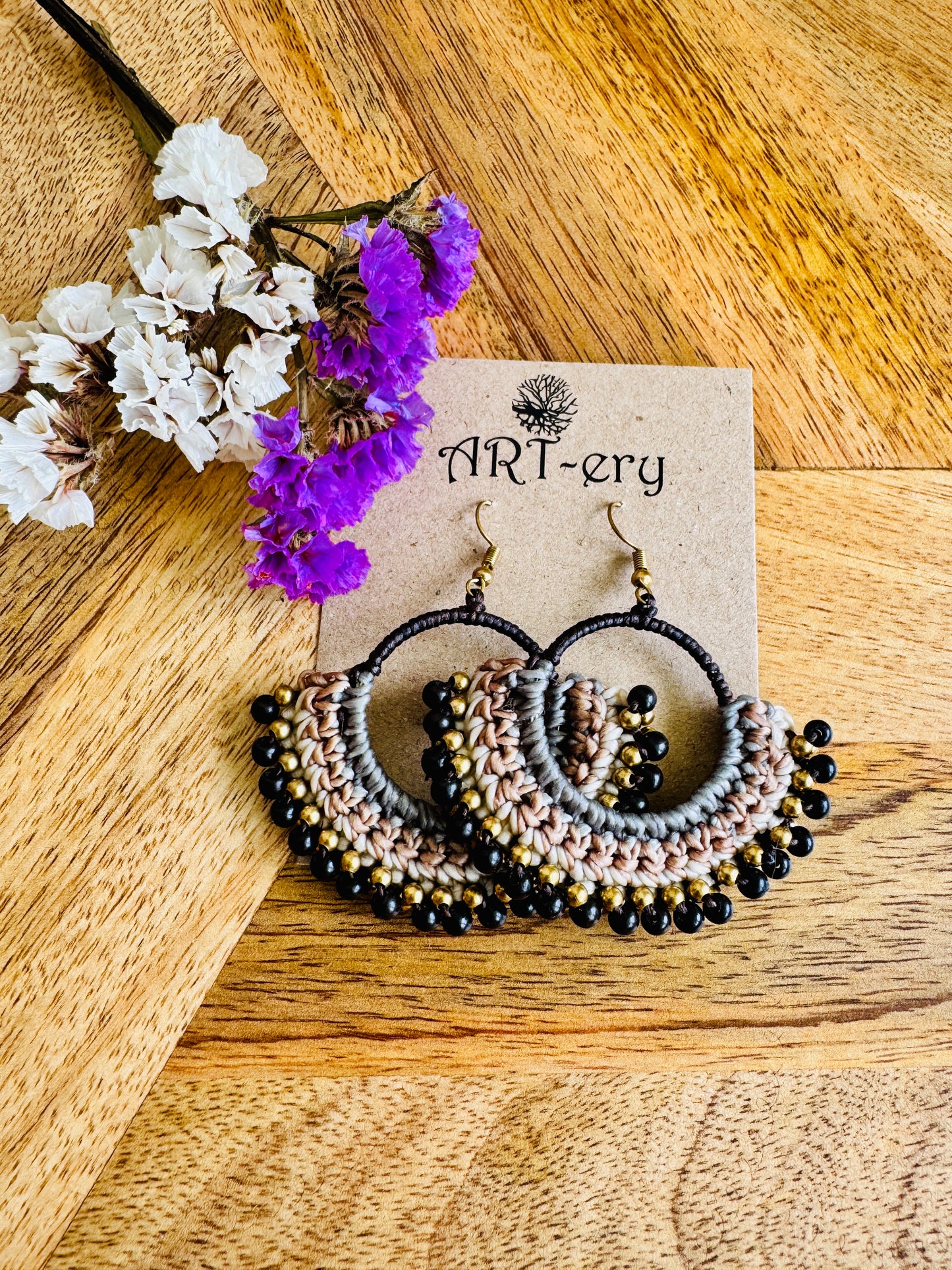Black beaded crochet earring with grey detailing
