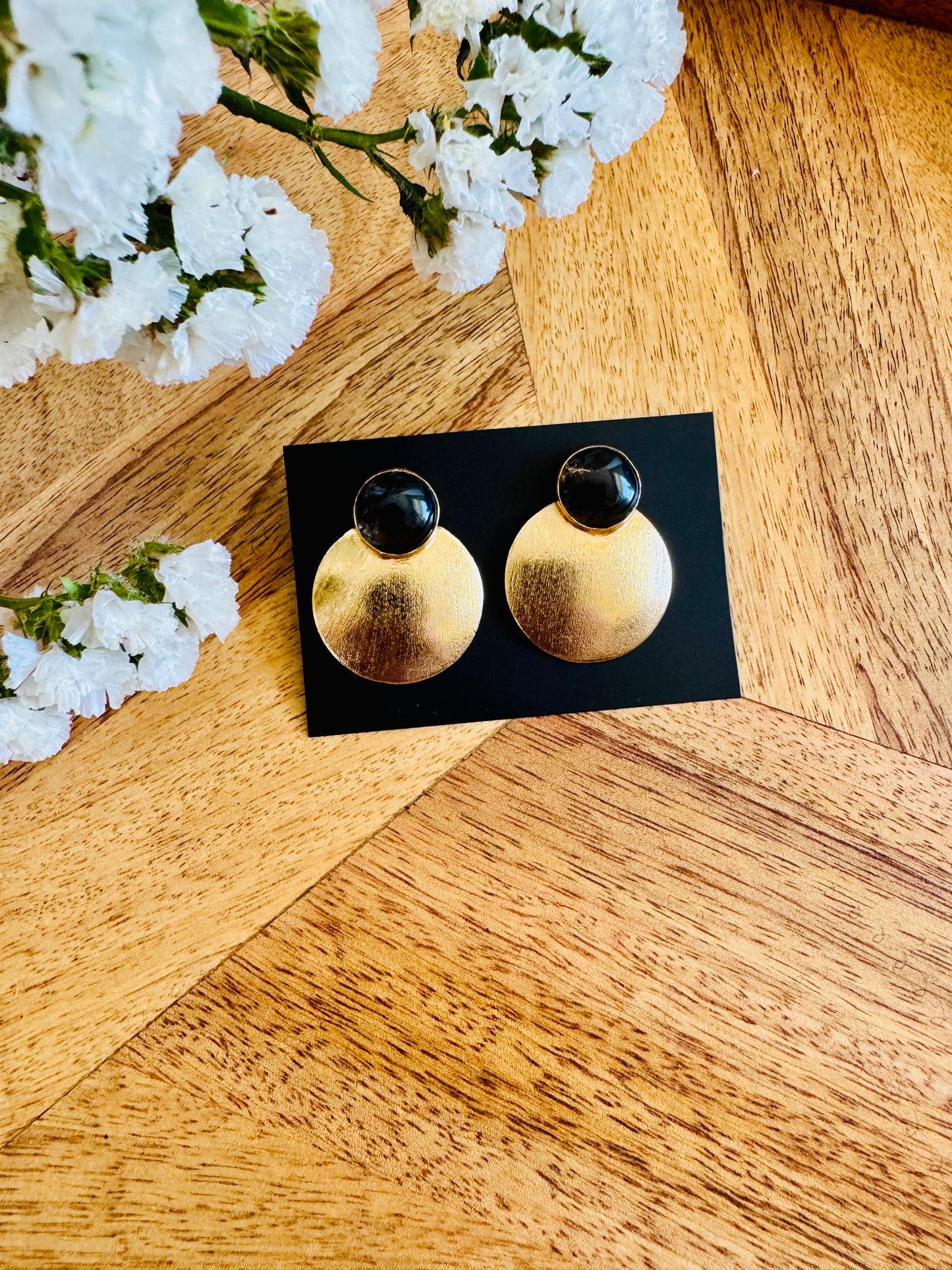 Black stone and brass circle