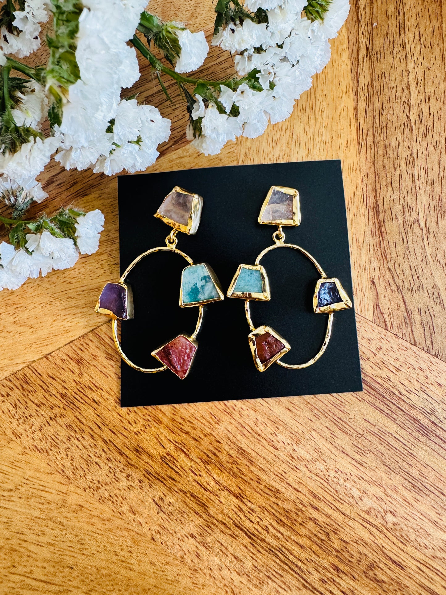 Coloured set stones in circle