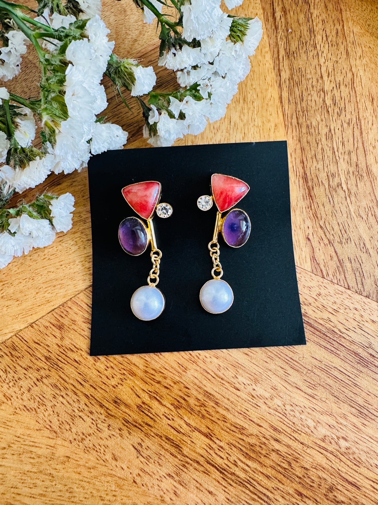 Playful coloured stones and pearl