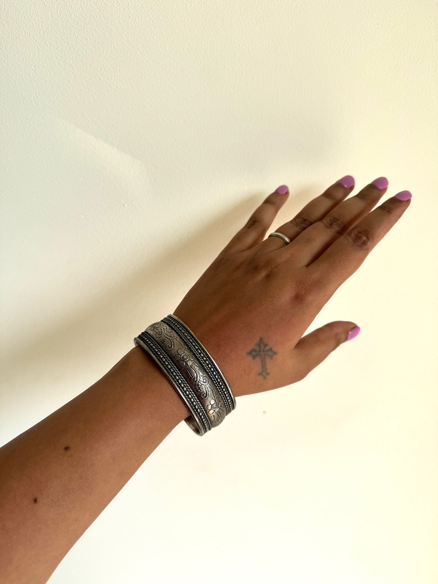Silver tone arm cuff