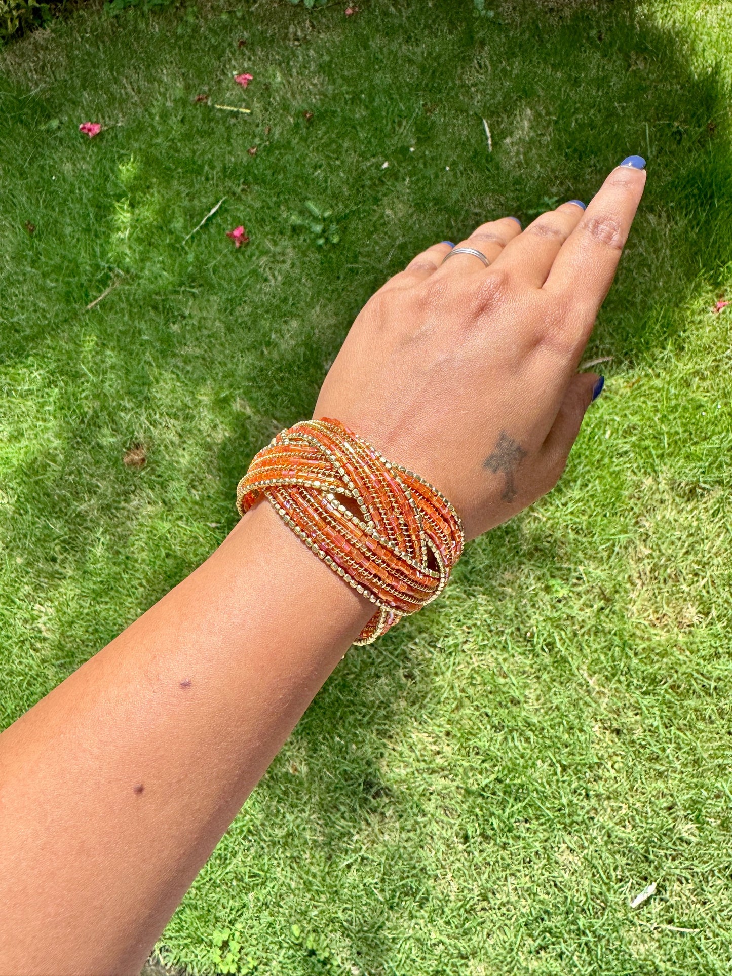 Beaded orange and gold free size arm cuff