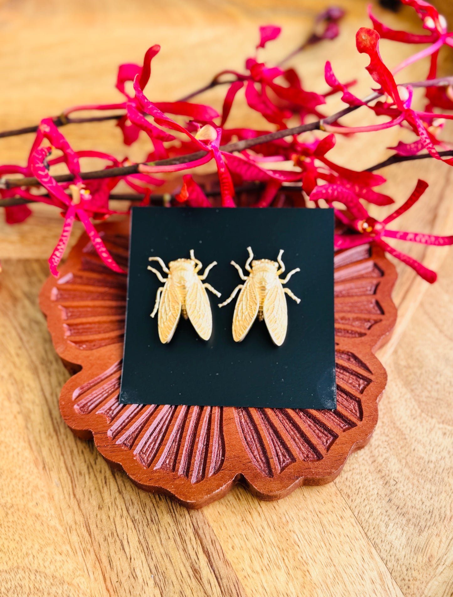 Insect inspired brass earring