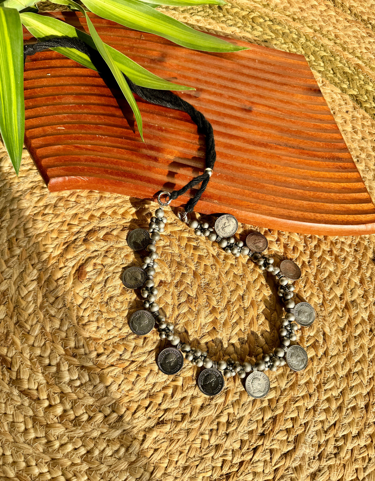 Coin necklace with adjustable thread