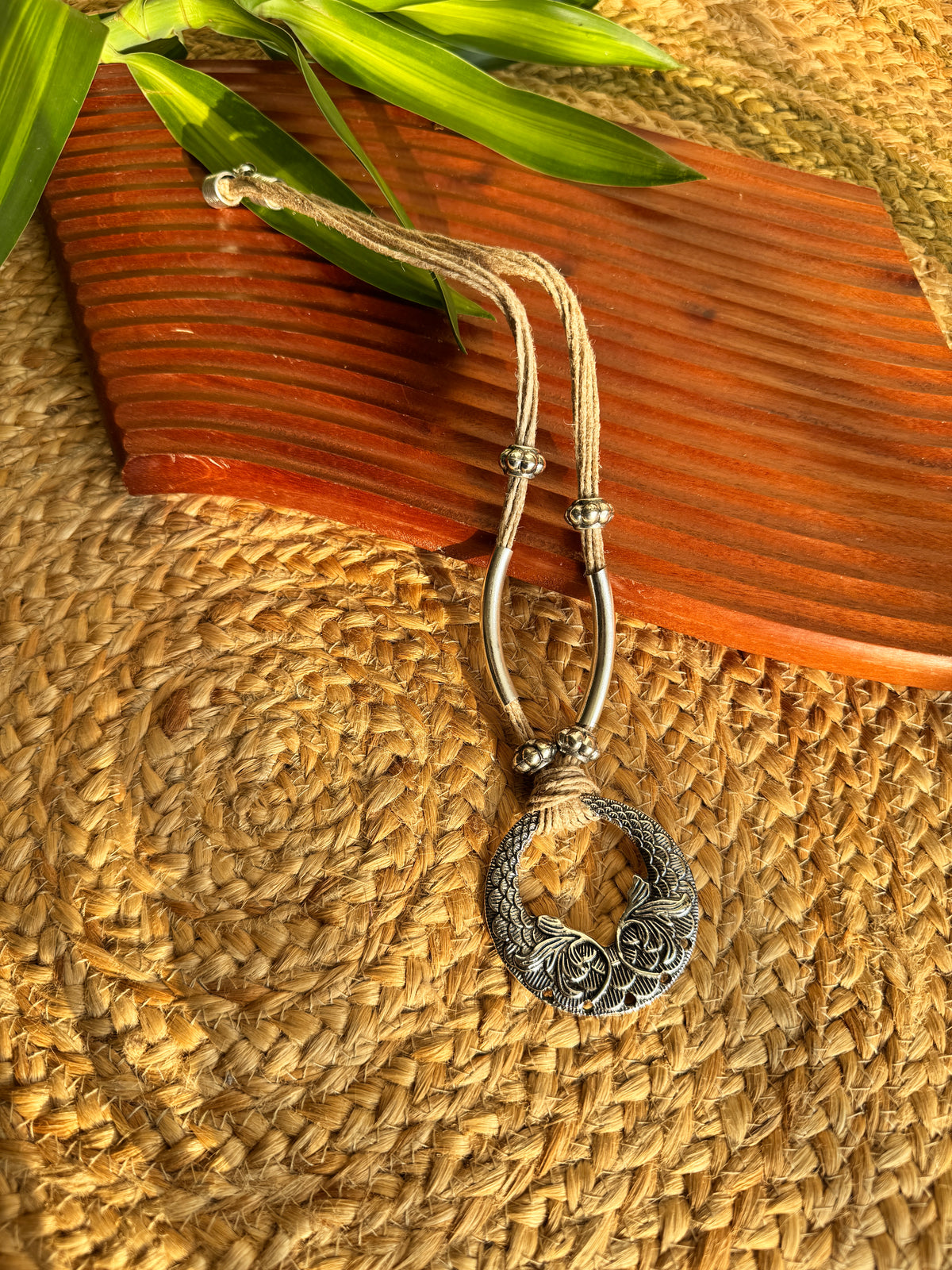 Silver tone jute thread necklace