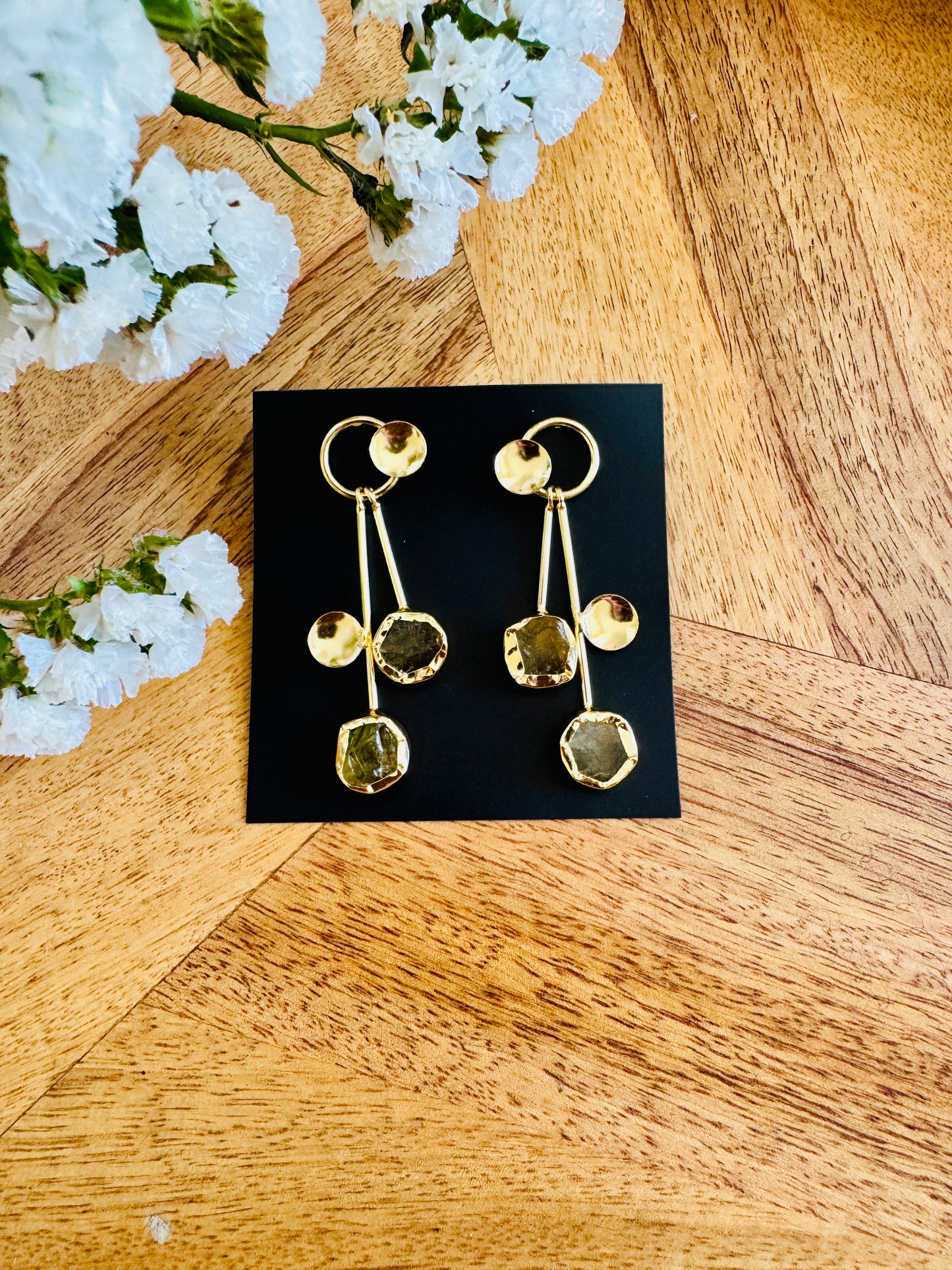 Circular yellow stones and brass circles