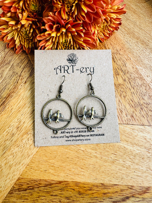 Sky Bird in earrings