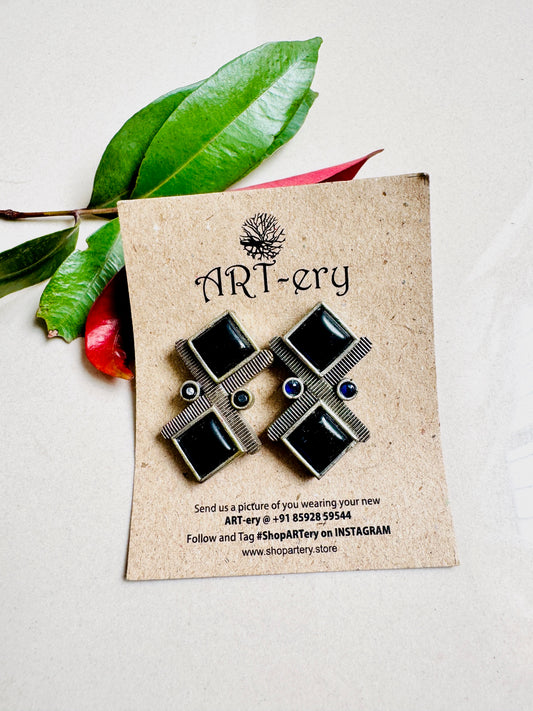 Triangle earring in oxidised silver