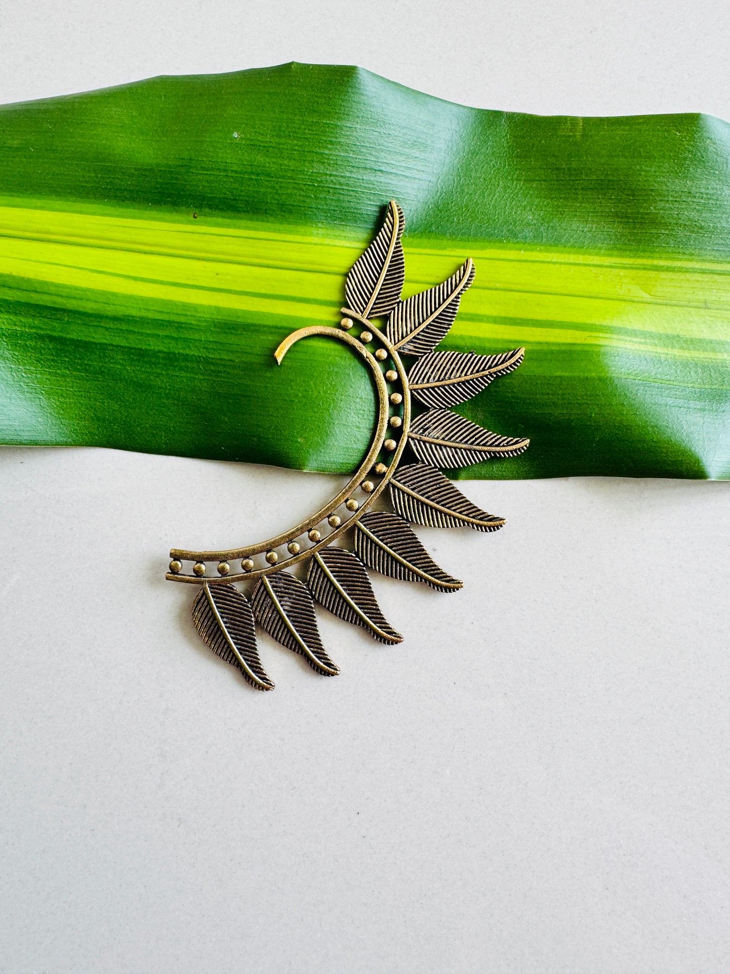 Ear cuff in gold tone leaf design