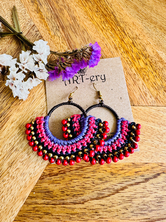 Red beaded crochet earring with purple detailing