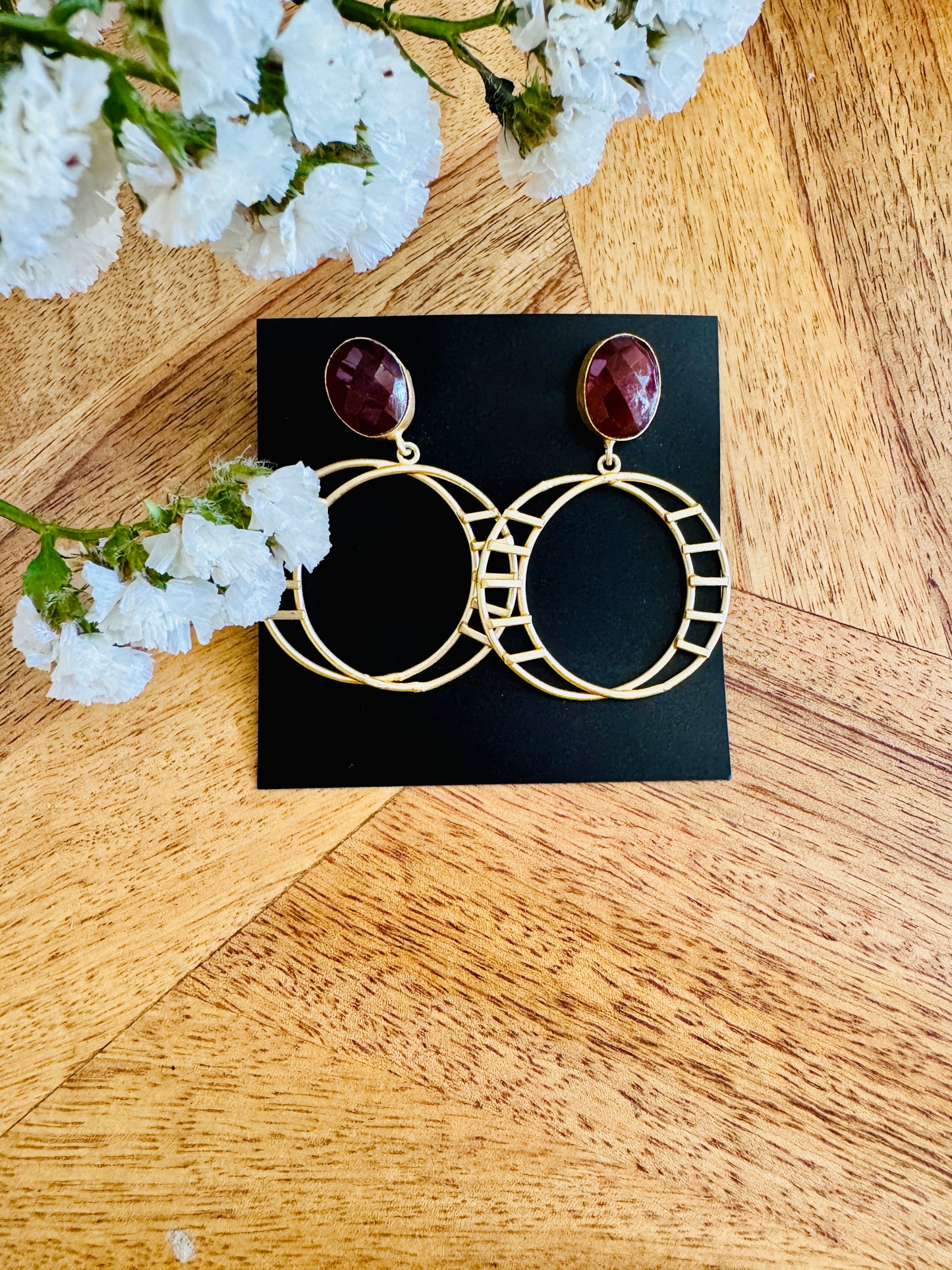 Cut red stone and circles