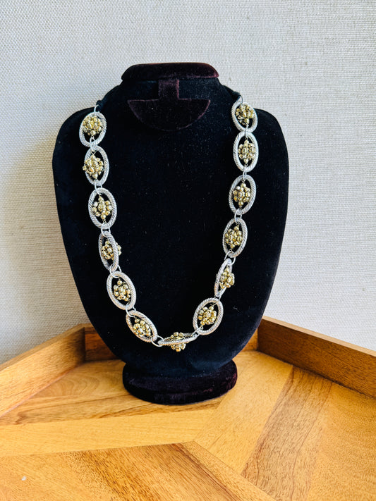 Statement metal necklace with adjustable cord
