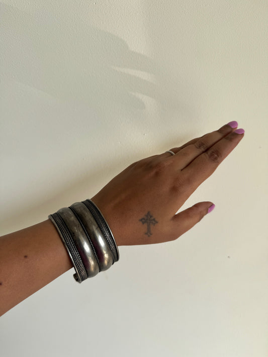 Silver tone arm cuff