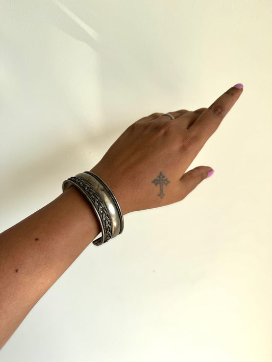 Silver tone arm cuff