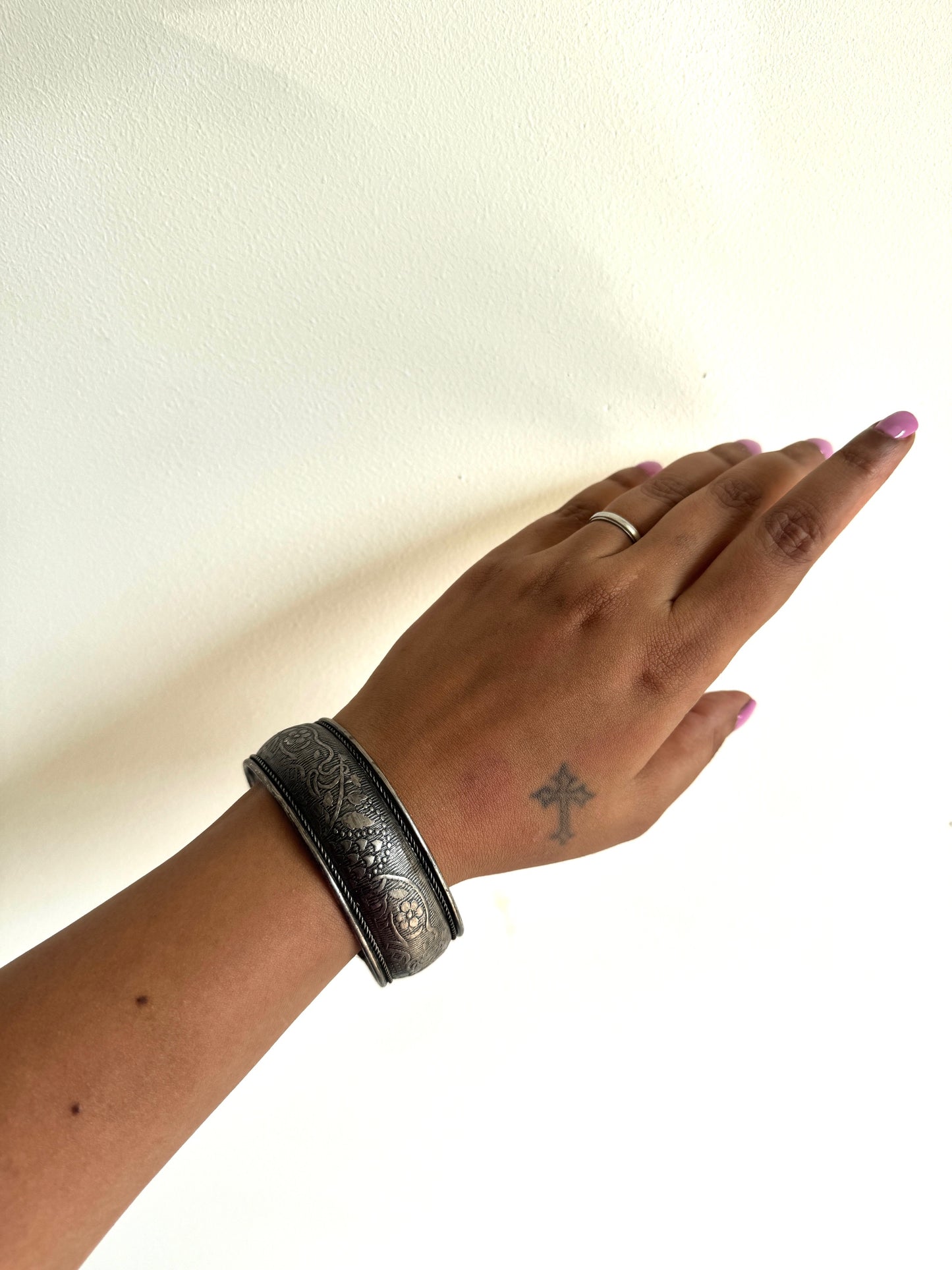 Silver tone arm cuff