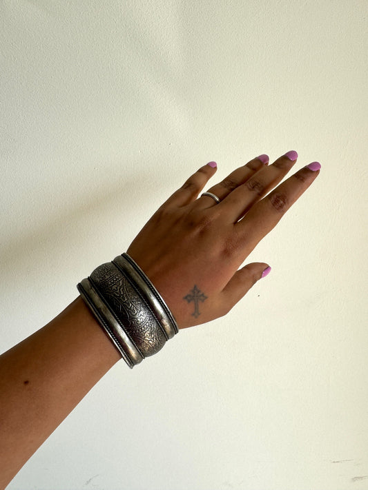 Silver tone arm cuff