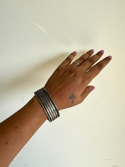 Silver tone arm cuff