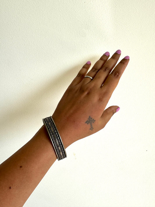 Silver tone arm cuff