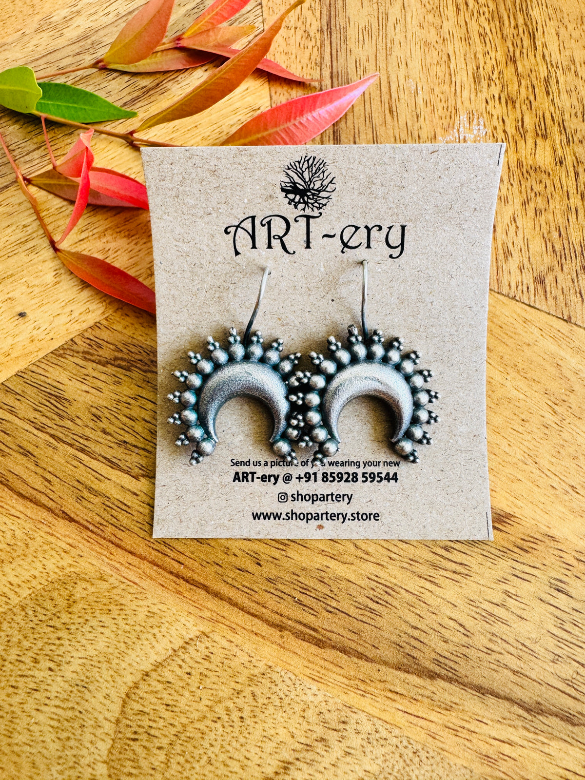Crescent drop earrings