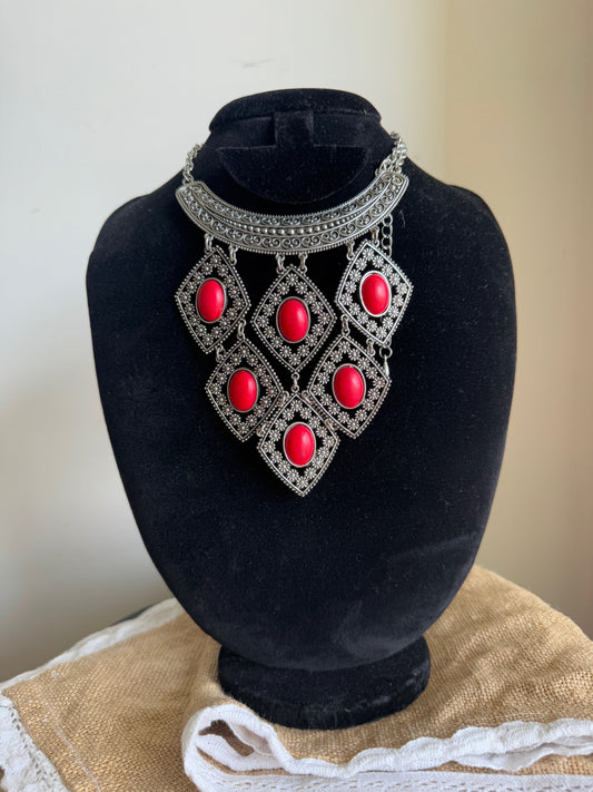 Oxidised silver with red stone