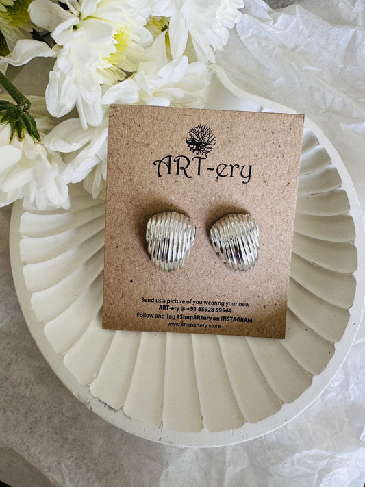 Shell earrings in silver tone