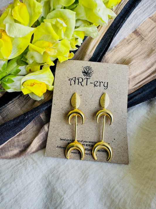 Crescent shaped brass earrings