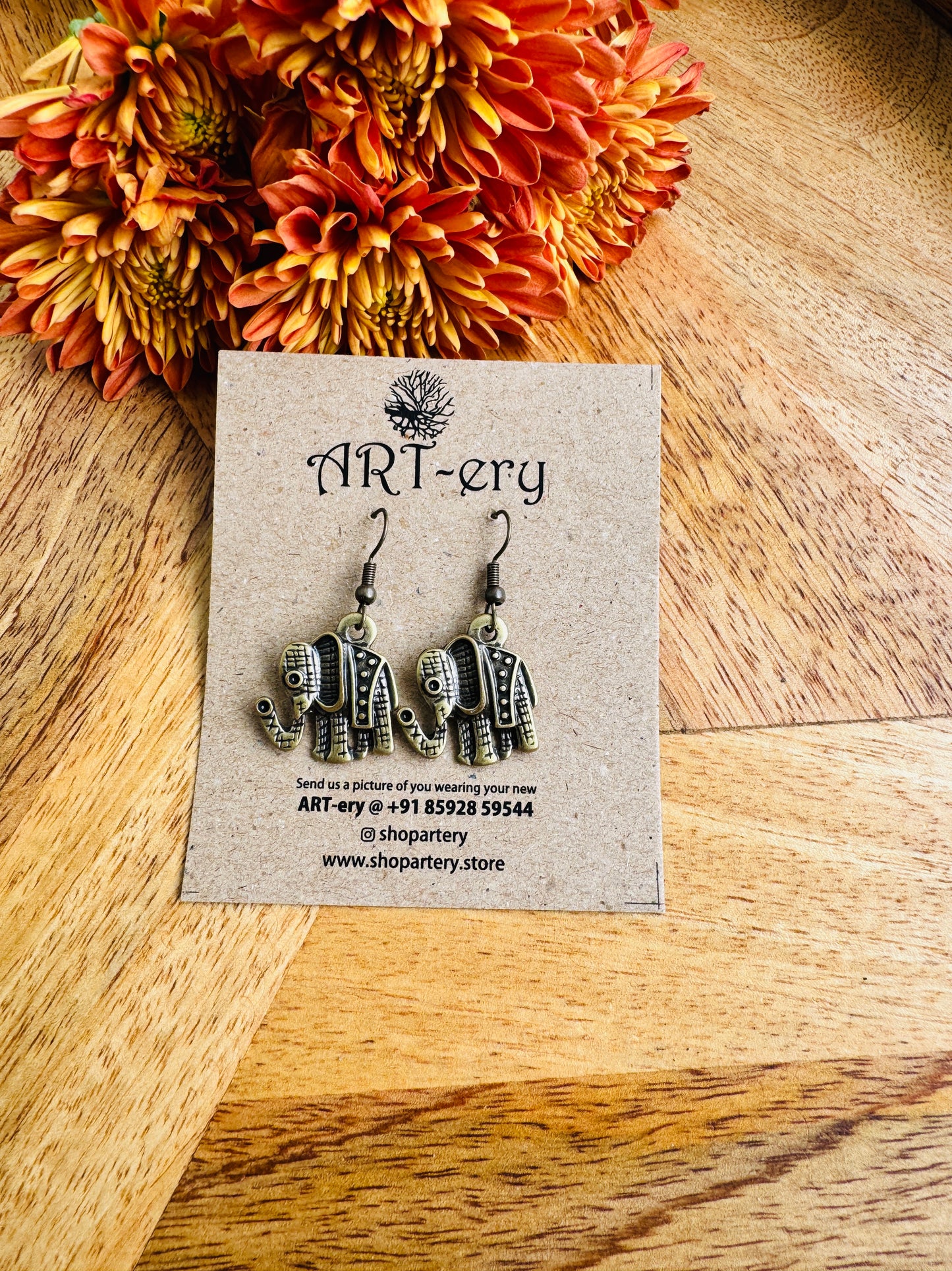 Tiny elephant earrings