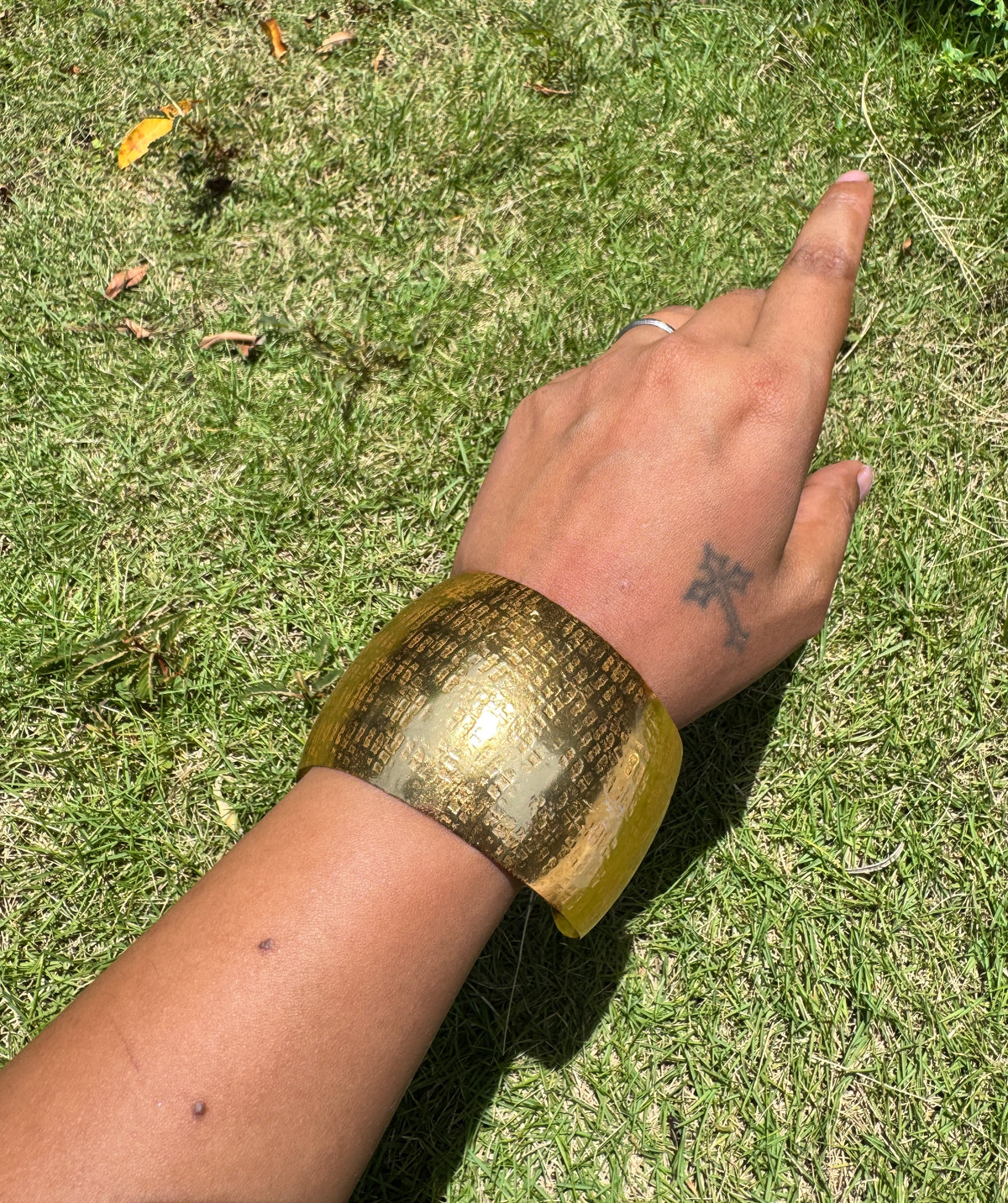 Abstract arm cuff in brass