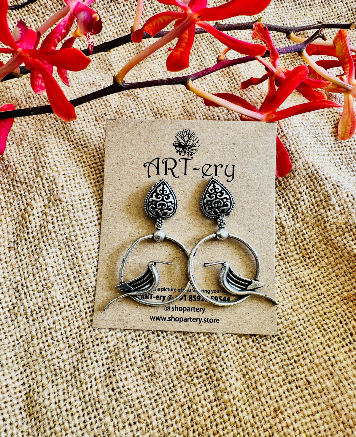 Bird on a ring earring