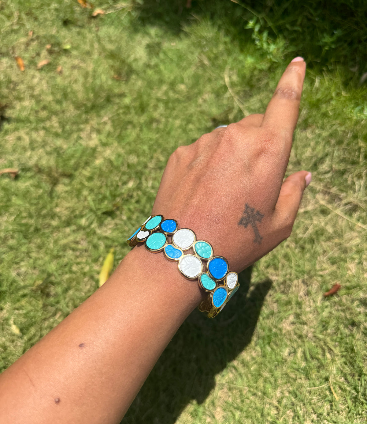 Blue and white in gold tone arm cuff