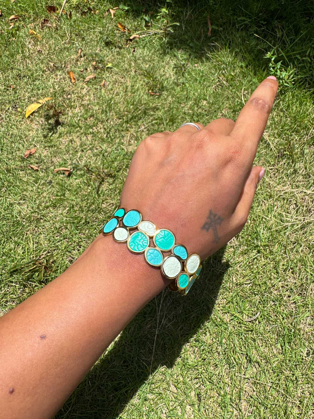 Teal and white in gold tone arm cuff