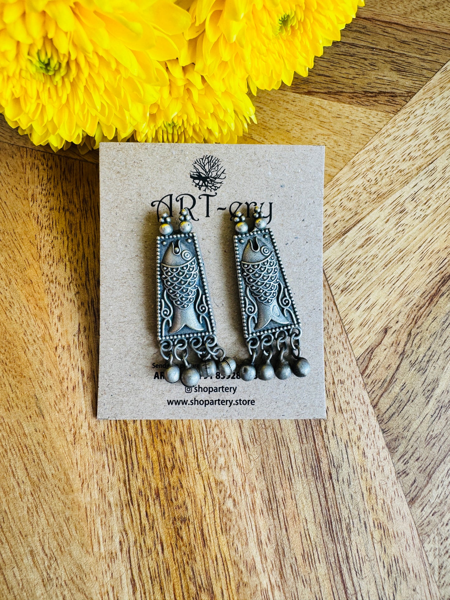 Fish statement stud in oxidised silver