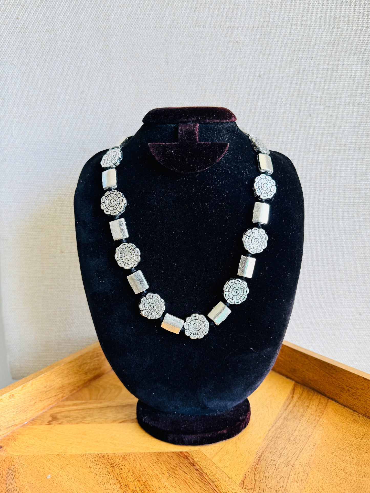 Statement metal necklace with adjustable cord