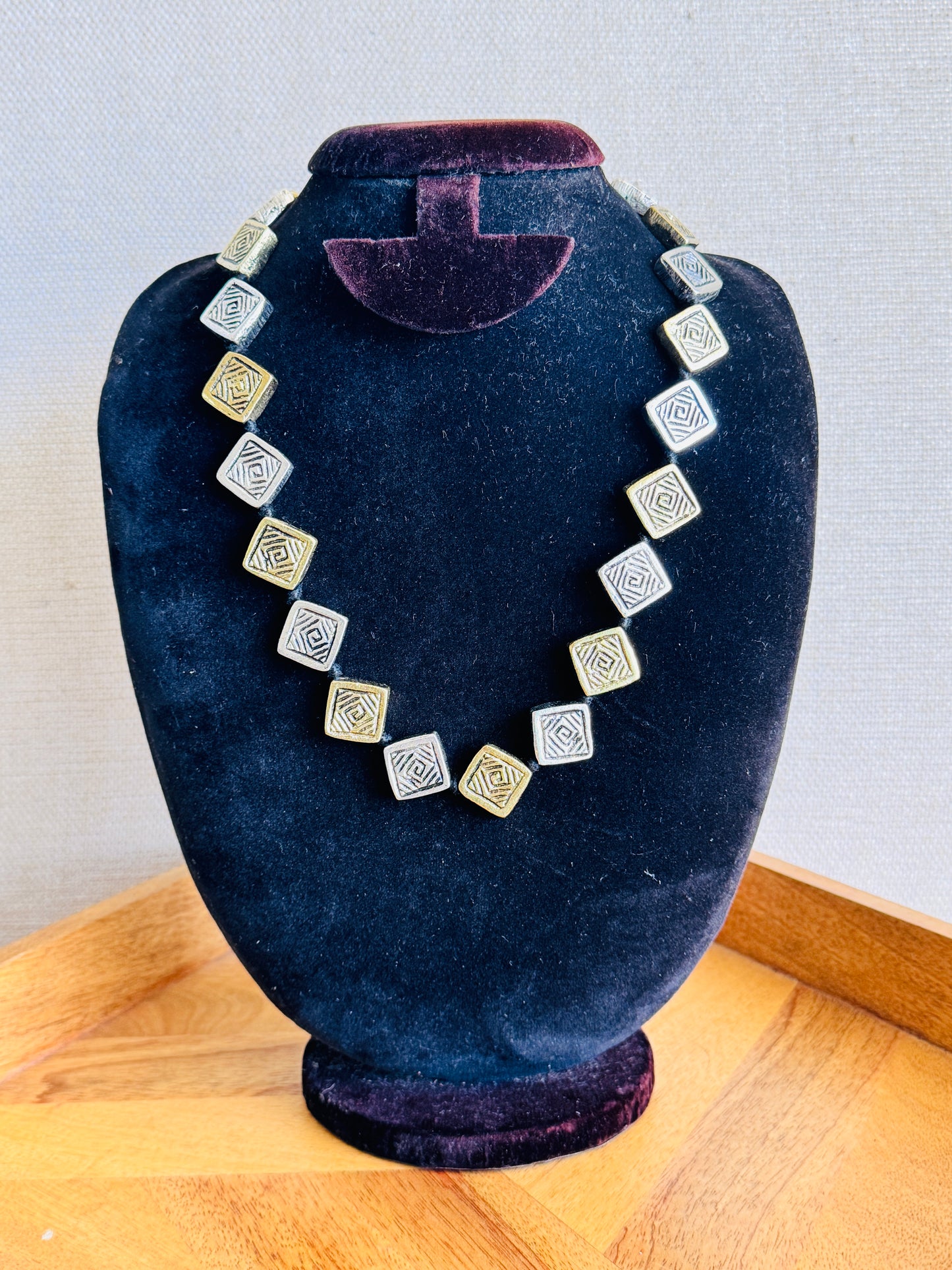 Statement metal necklace with adjustable cord
