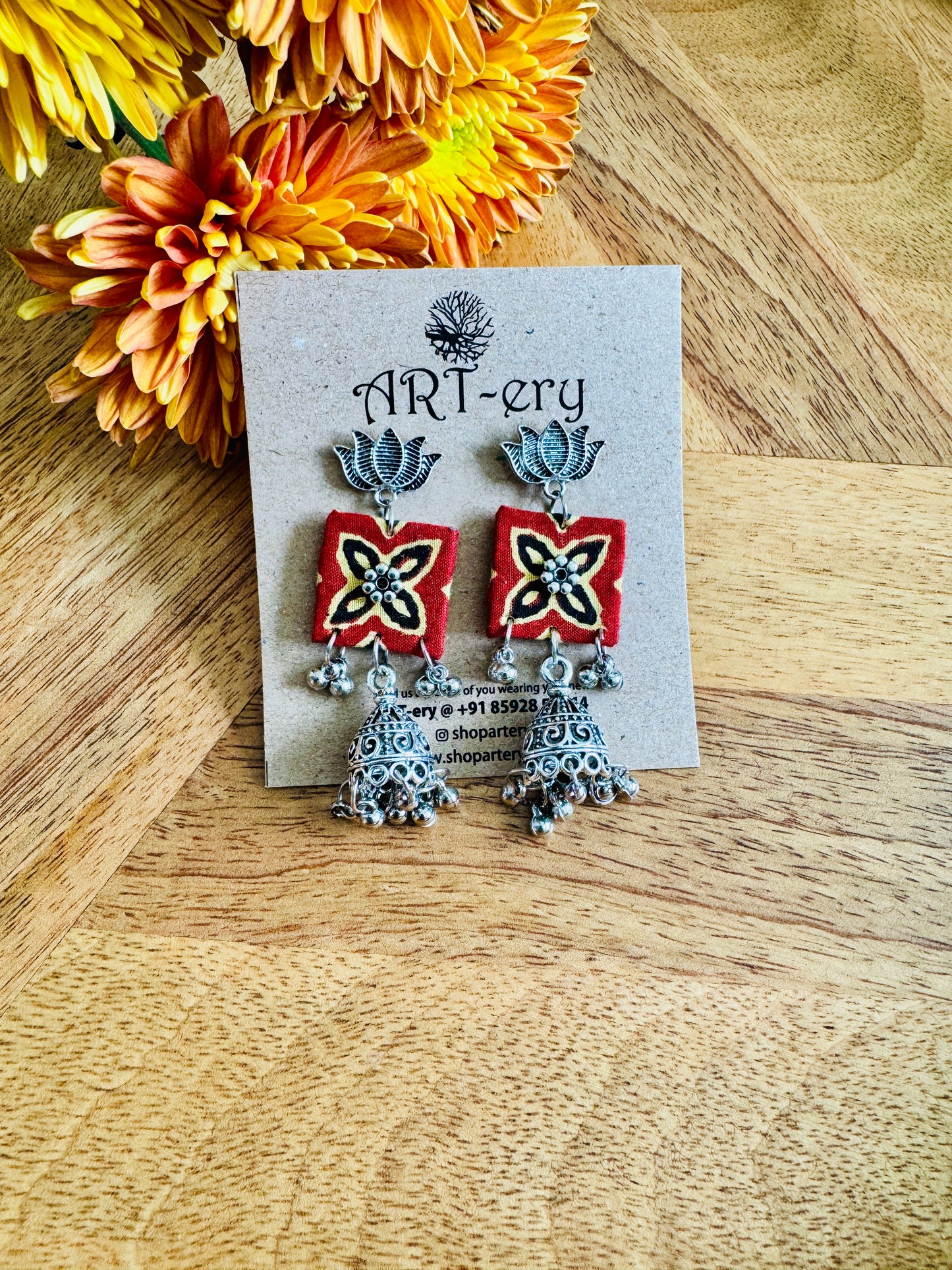 Geometric oxidised silver fabric earrings with jhumka detailing