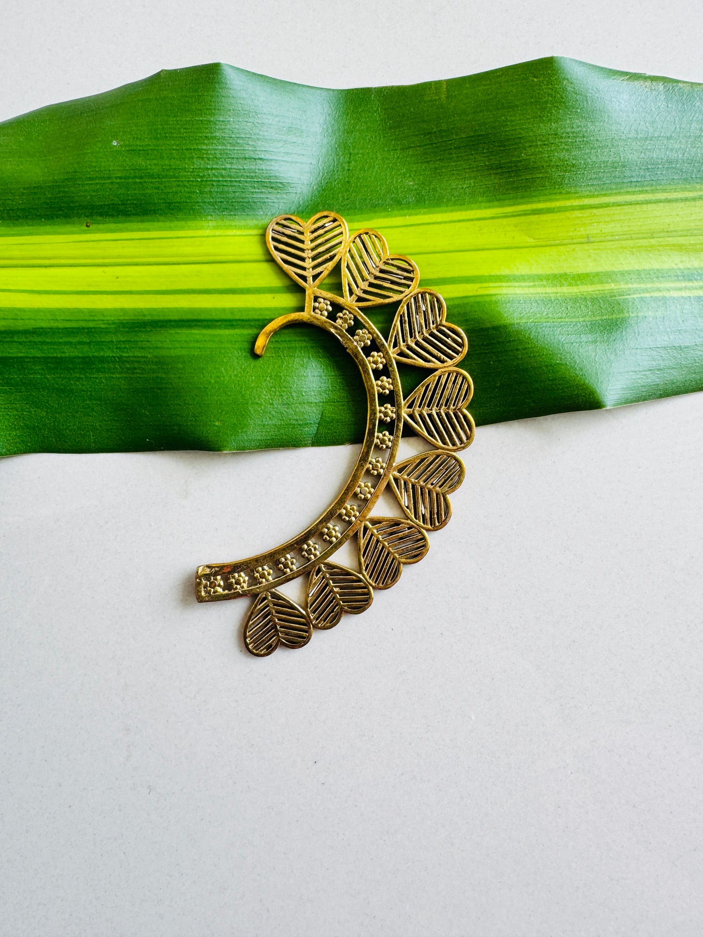 Ear cuff in gold tone heart design