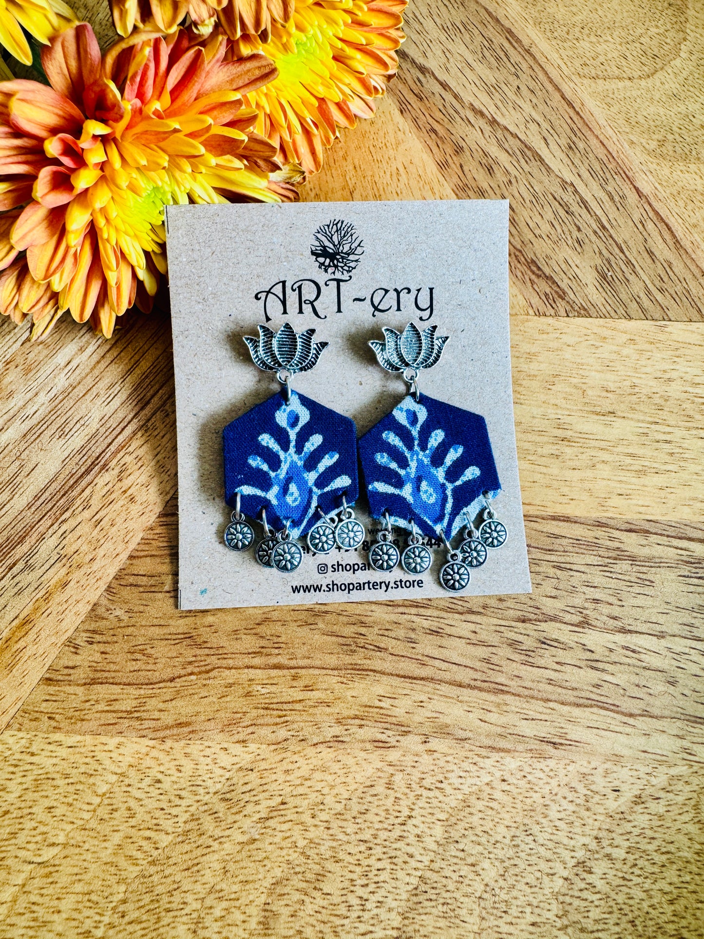 Blue printed oxidised silver fabric earrings with lotus detailing