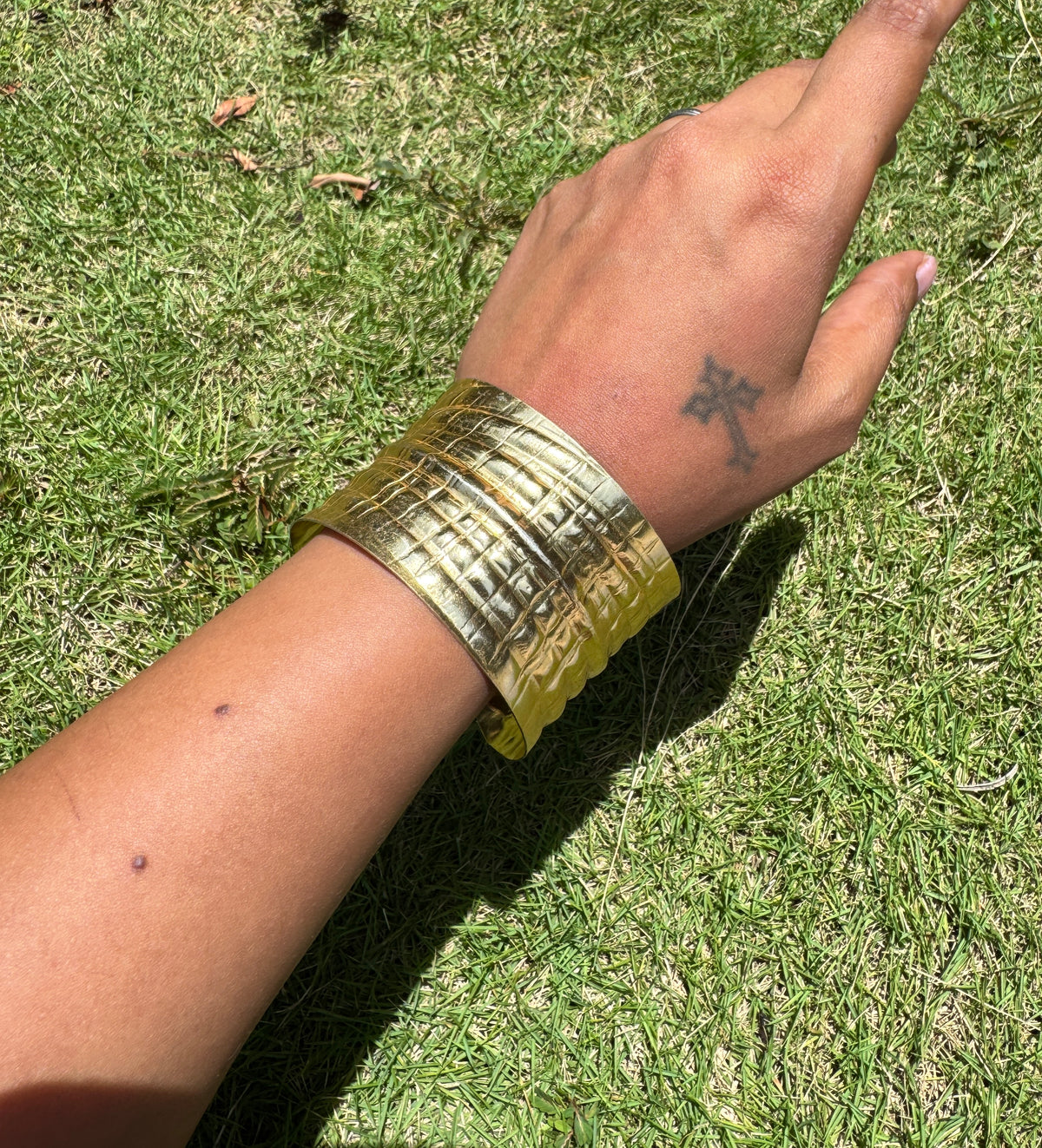 Abstract arm cuff in brass