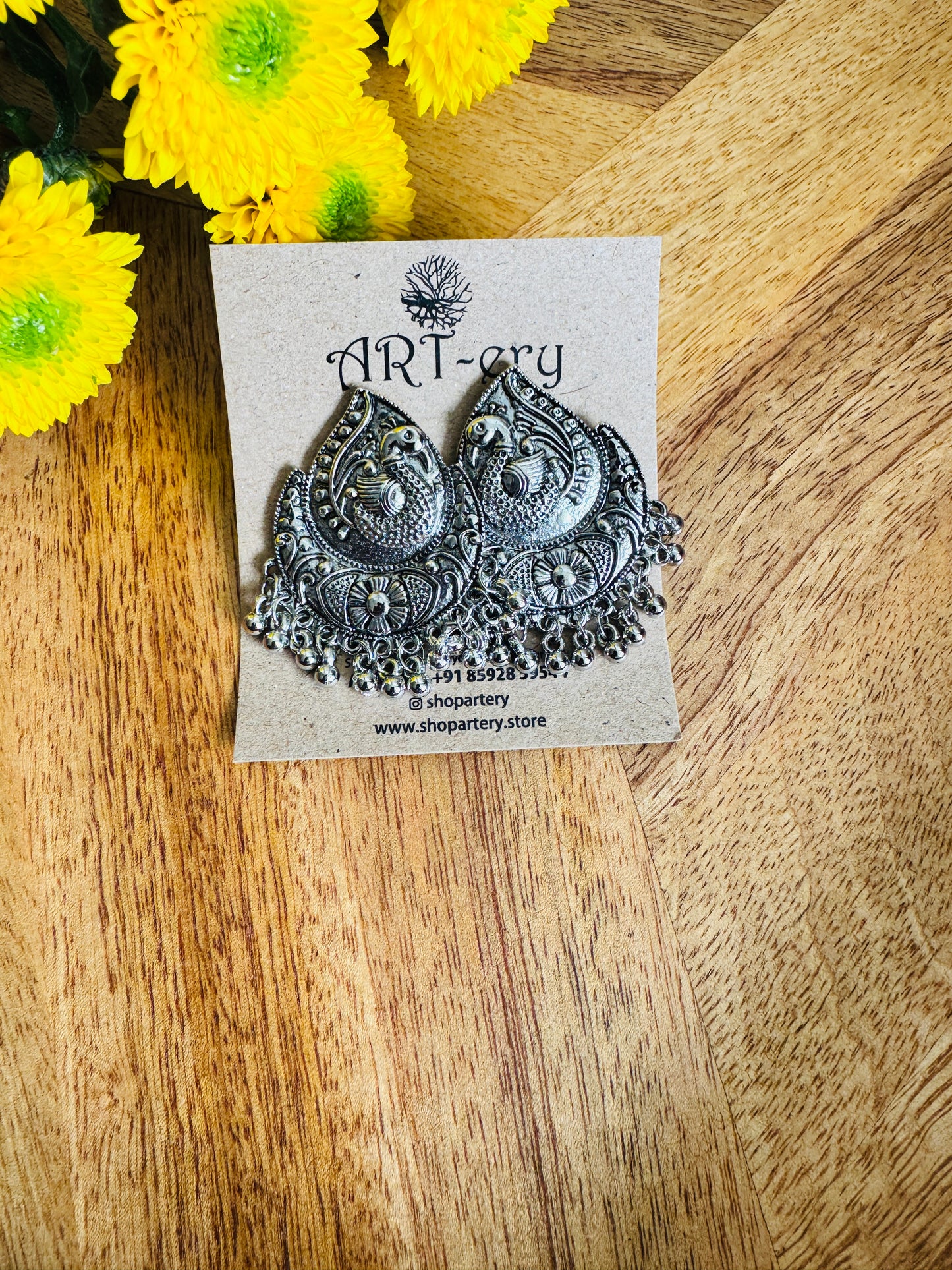 Peacock oxidised silver earring