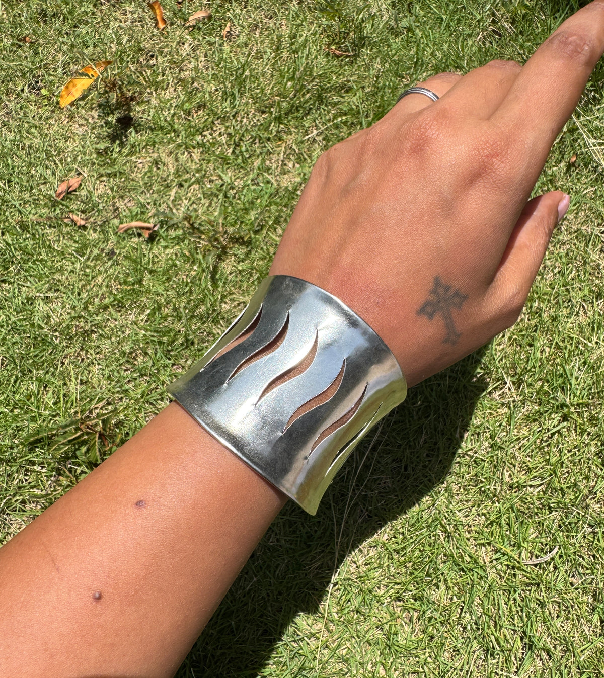 Abstract arm cuff silver tone