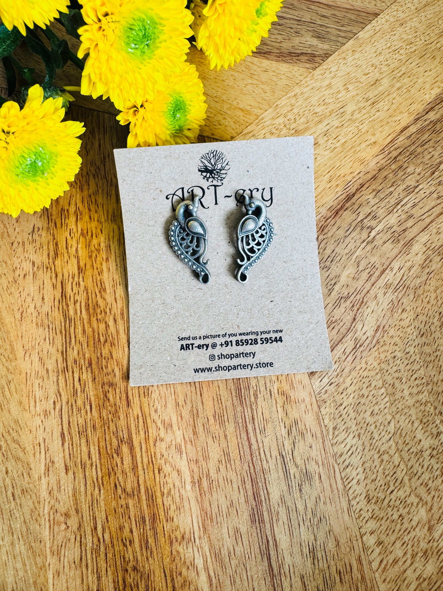 Small peacock oxidised pearl earrings